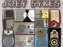 JOEY SYKES